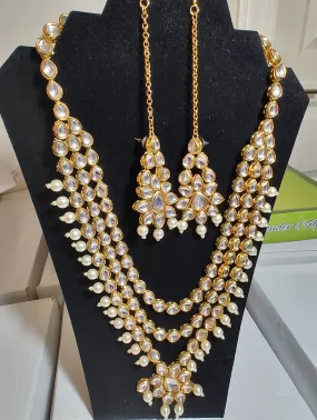 Attractive Three Layer Kundhan Necklace With Pearls And Chain Hanging