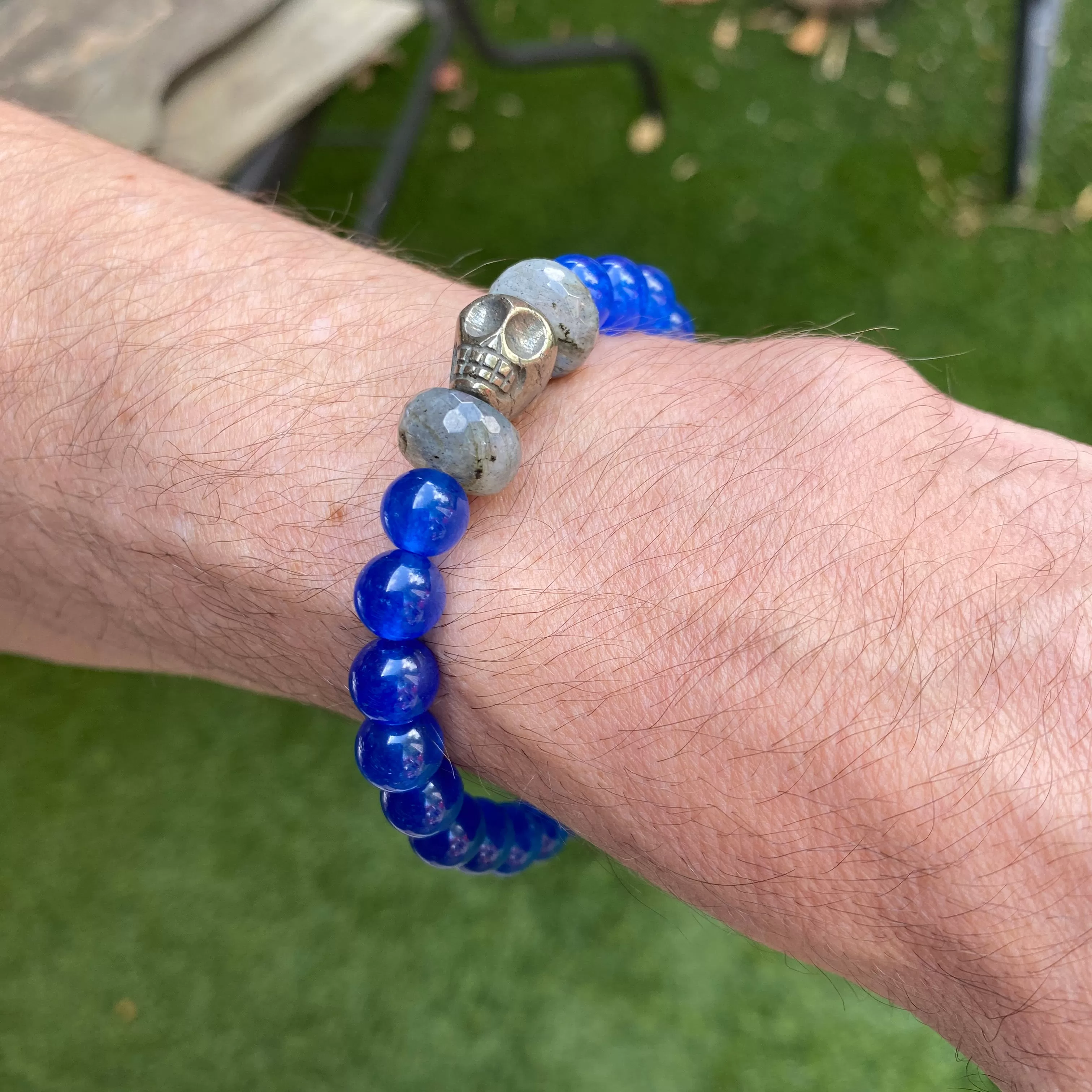 Men’s Blue onyx, pyrite skulls, and labradorite gemstone stretch bracelet