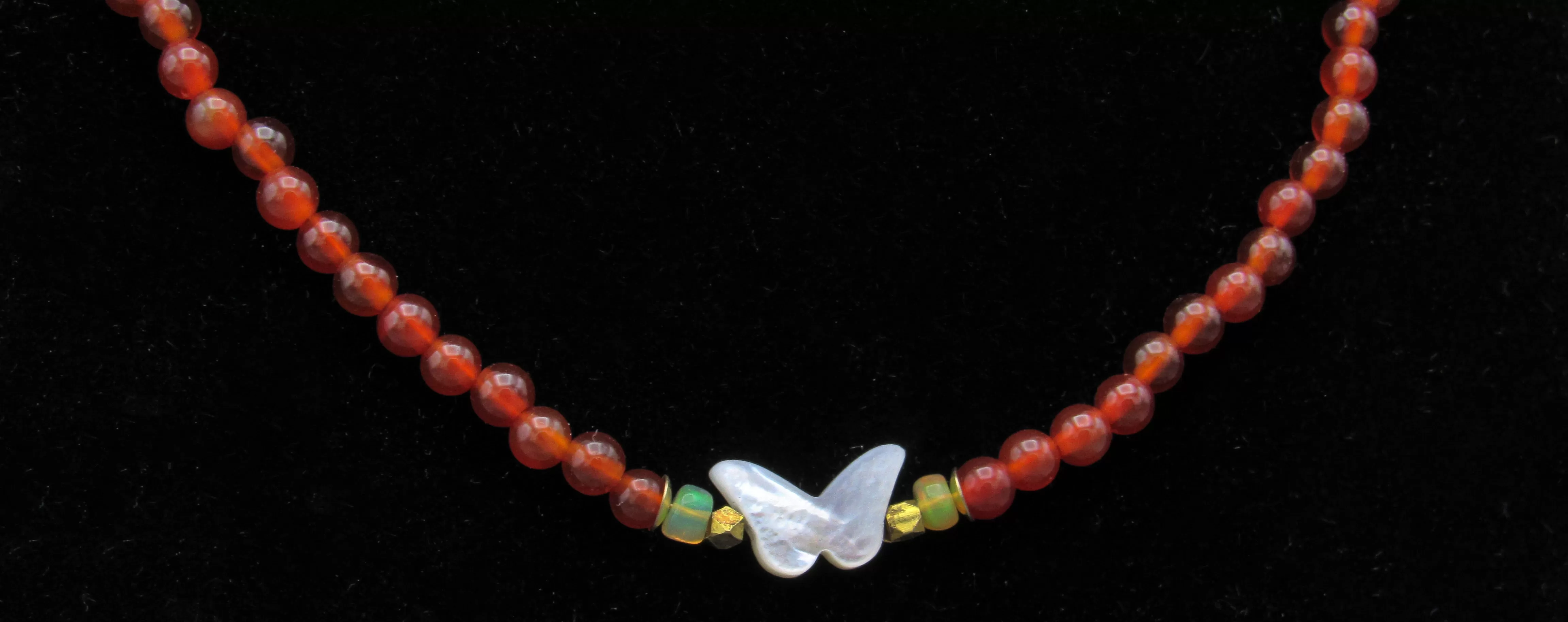 Mother of Pearl Butterfly, Red Onyx gemstone, and Ethiopian Fire opals w/ 14 kt gf Components